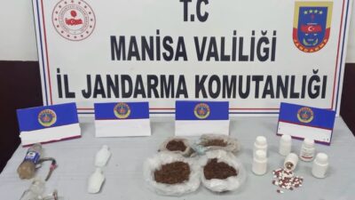 Evinde 1 kilo uyuşturucu ve yüzlerce hapla yakalandı
